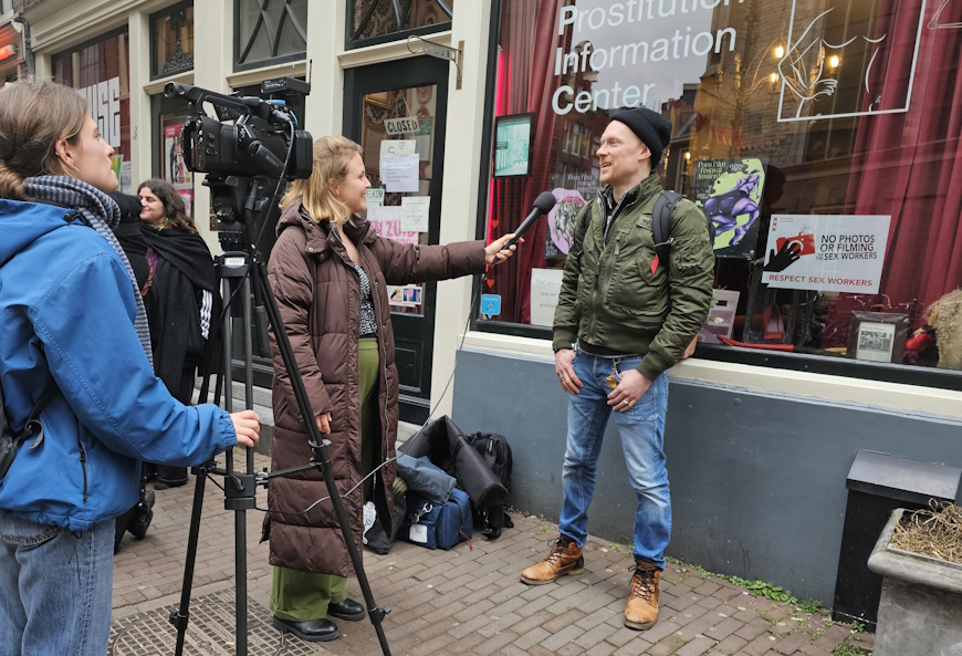 PlayMale answers questions during a television interview at the Amsterdam Erotic Film Festival
